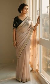 Cream Soft Silk Saree with Designer Heavily Embroidered Black Blouse
