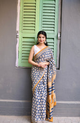 Hand-Block Printed Indigo & Ochre Cotton Saree with Elegant White Sleeveless Blouse Set
