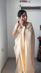 Elegant Ivory Banarasi Silk Saree with Intricate Self-Weave Geometric Pattern