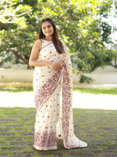 Elegant Off-White Floral Printed Saree with Designer Sleeveless Blouse Set