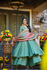 Elegant Sage Green Layered Flared Suit with Traditional Weaved Dupatta