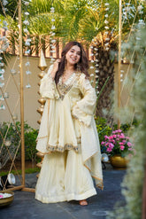 Embroidery Designer Off-White Georgette Sharara Suit – Mirror Embroidered Neckline with Cowrie Shell Latkans