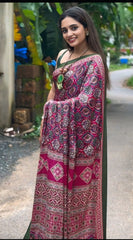 The Earthy Fusion: Deep Berry Floral Saree with Statement Forest Green Blouse