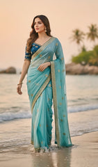 Designer Seafoam Saree with Teal Velvet Embroidered Blouse | Boho-Chic Cowrie Shell Detailing