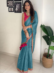 Elegant Teal Metallic Shimmer Saree with Magenta Scalloped Border & Pom-Pom Tassels