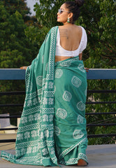 Forest Green Mulmul Saree with White Discharge Prints and Contrasting Puff-Sleeve Blouse Styling
