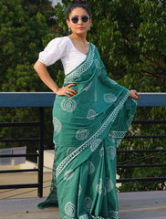 Forest Green Mulmul Saree with White Discharge Prints and Contrasting Puff-Sleeve Blouse Styling
