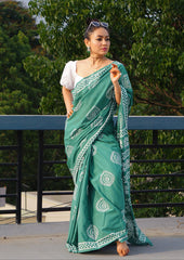 Forest Green Mulmul Saree with White Discharge Prints and Contrasting Puff-Sleeve Blouse Styling