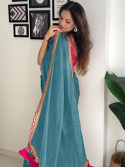 Elegant Teal Metallic Shimmer Saree with Magenta Scalloped Border & Pom-Pom Tassels