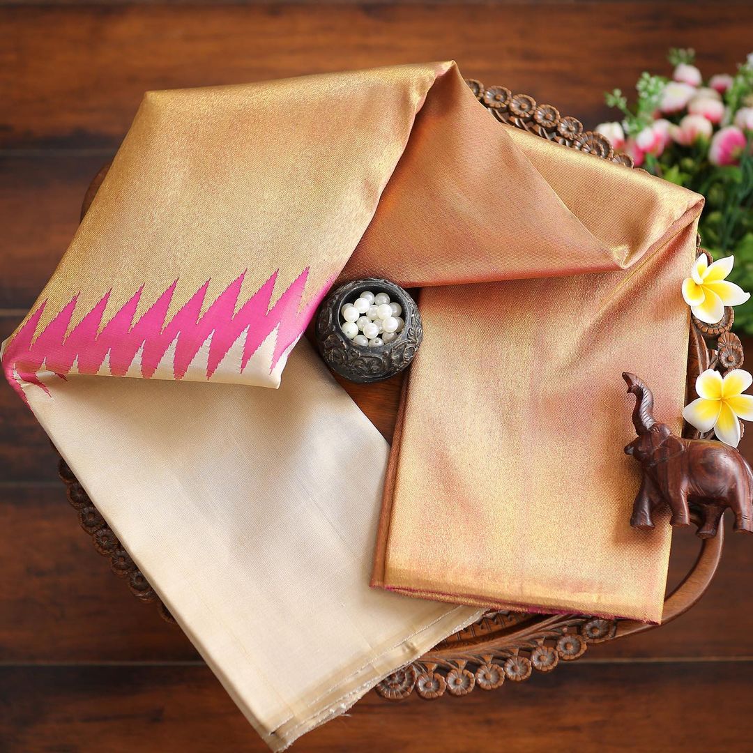 Radiance in Silk: Dual-Tone Cream and Hot Pink Festive Saree