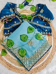 Designer Seafoam Saree with Teal Velvet Embroidered Blouse | Boho-Chic Cowrie Shell Detailing