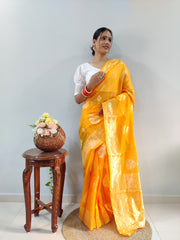 Elegant Mustard Yellow Banarasi Silk Saree with Gold Zari Weave & White Chikankari Style Puff-Sleeve Blouse