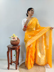Elegant Mustard Yellow Banarasi Silk Saree with Gold Zari Weave & White Chikankari Style Puff-Sleeve Blouse