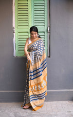 Hand-Block Printed Indigo & Ochre Cotton Saree with Elegant White Sleeveless Blouse Set