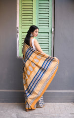 Hand-Block Printed Indigo & Ochre Cotton Saree with Elegant White Sleeveless Blouse Set