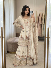 Cream Silk Sharara Suit – Peplum Style Kurta with Reindeer Embroidery and Sequin Border Dupatta