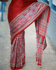 Royal Crape Ajrakh-Print Saree in Soft Silk – Handcrafted Border & Pallu with Matching Polka-Dot Blouse Piece