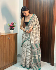 Elegance in Cotton: Hand-Block Print Saree in Ivory & Emerald Green with Boho-Chic Blouse Piece