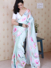 Ethereal Sky Blue Satin Silk Saree with Pastel Floral Prints & Pearl Lace Border