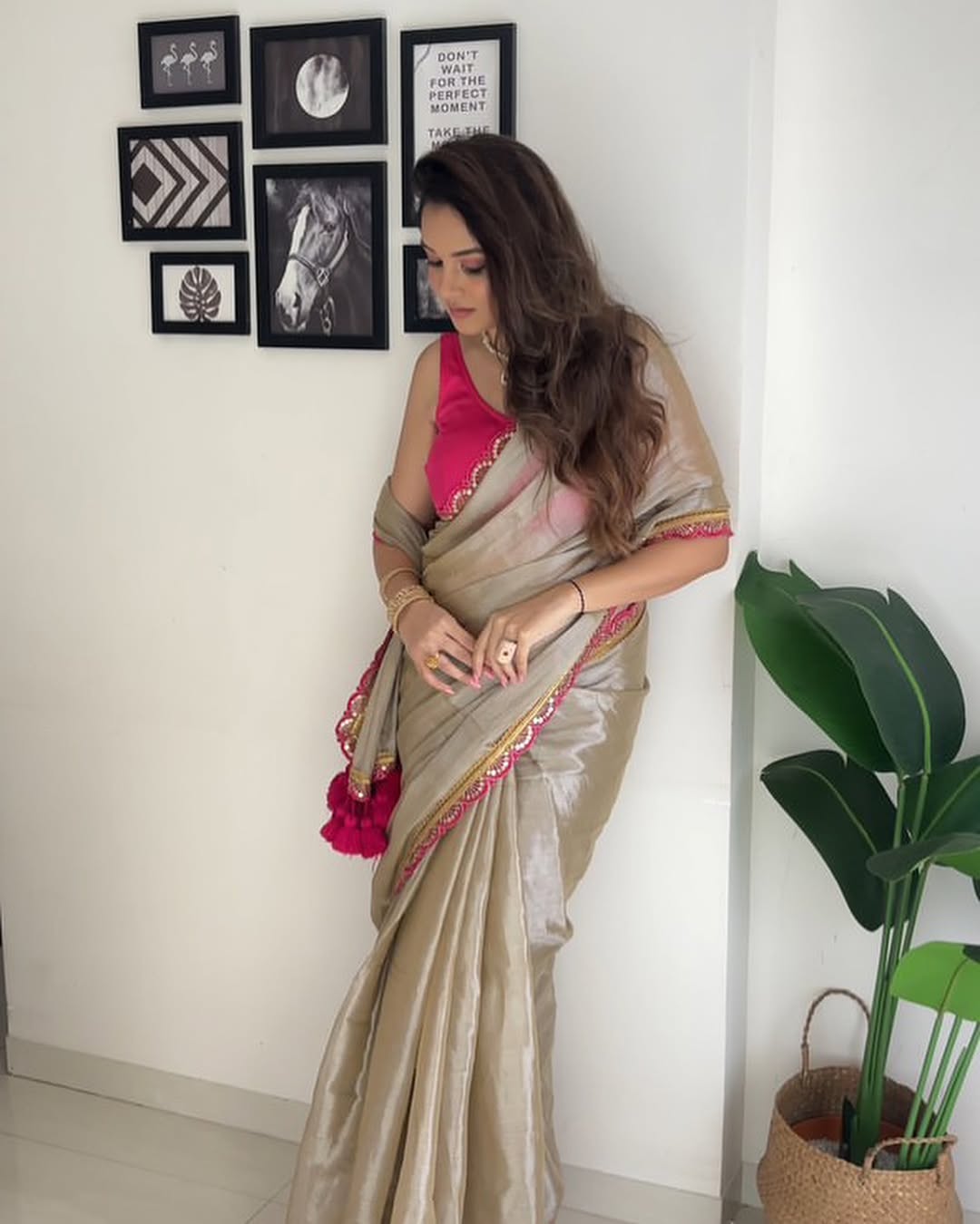 Shimmering Champagne Tissue Silk Saree with Rani Pink Scalloped Embroidery and Tassel Detail