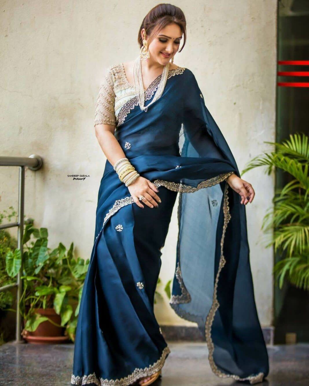 Elegant Navy Blue Georgette Saree with Scalloped Embroidered Border & Designer White Sequin Blouse