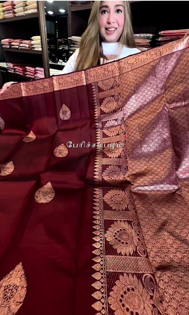 Royal Maroon Silk Saree with Antique Copper Zari Weaving & Leaf Butta Motifs