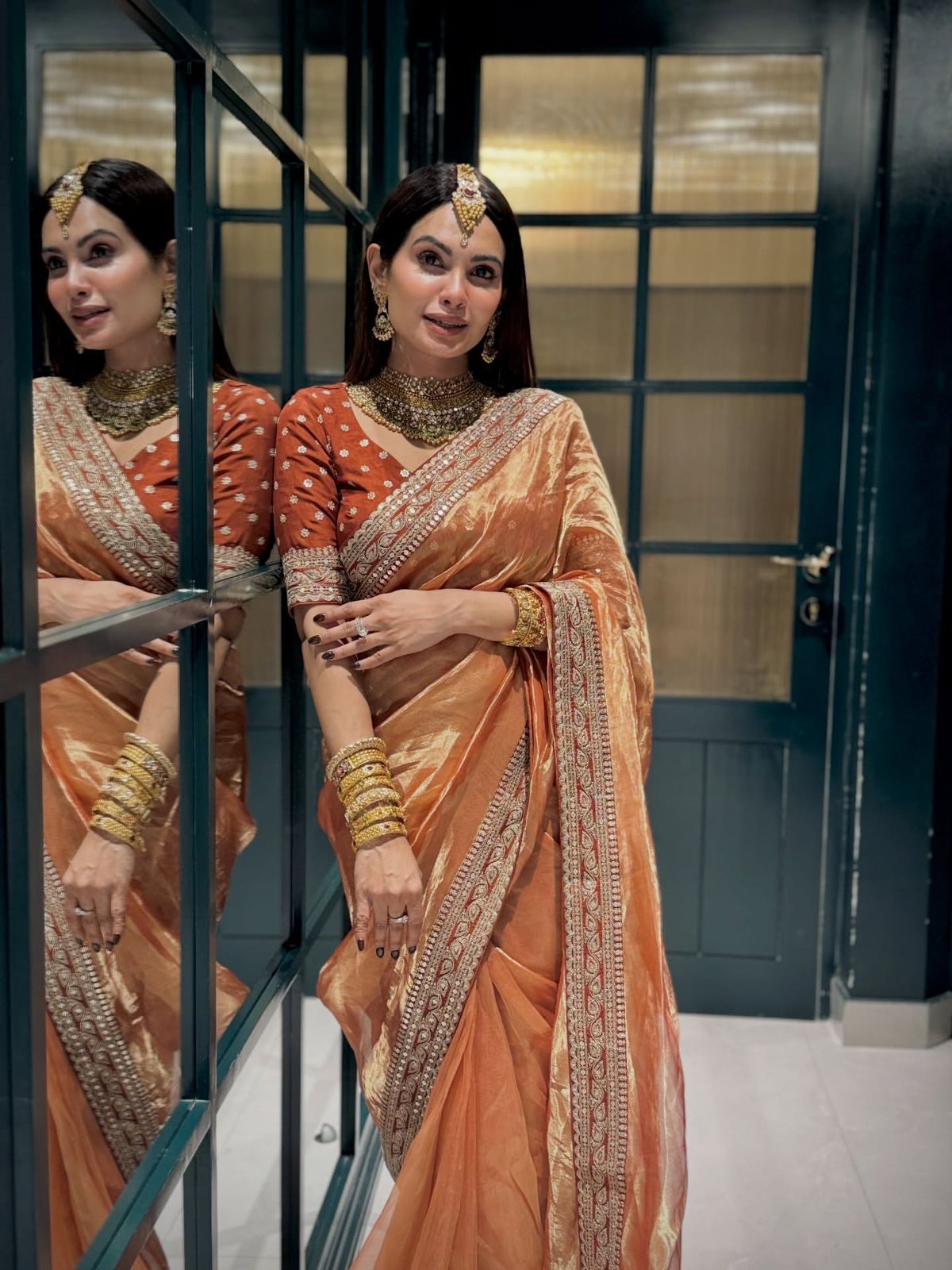 Copper Metallic Silk Saree with Heavy Embroidered Border and Unstitched Blouse