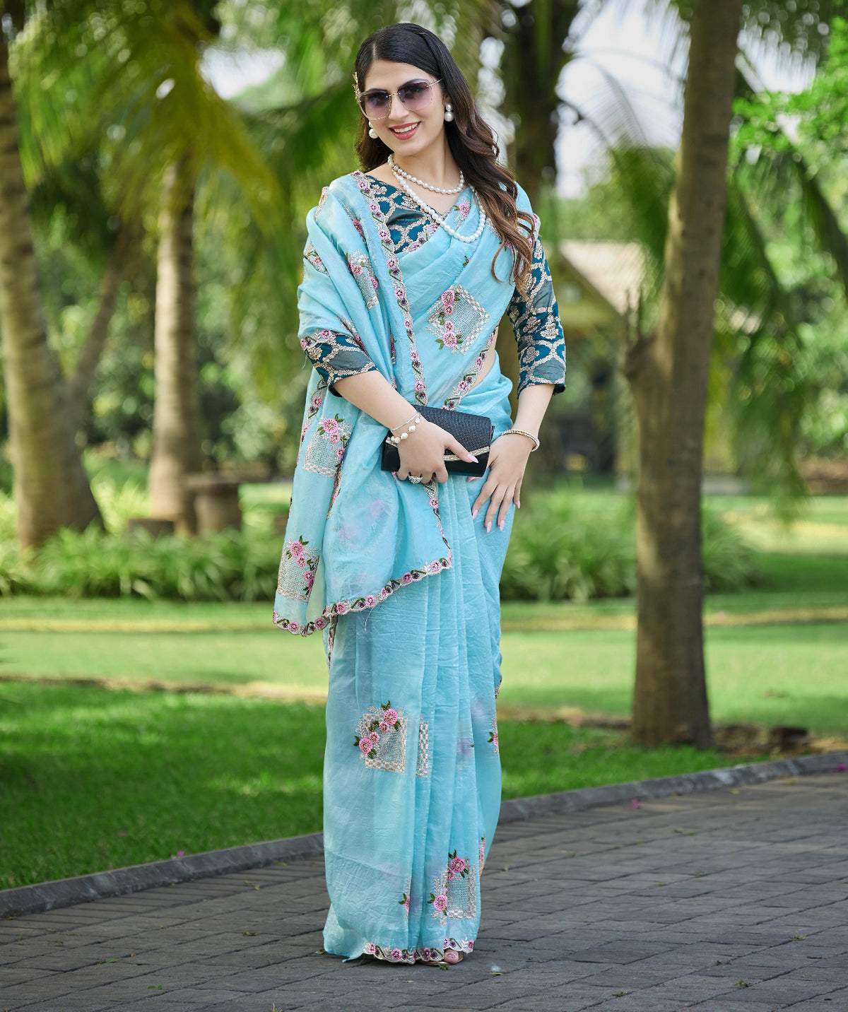 Sky Blue  Saree with Embroidered Floral Motifs & Contrasting Teal Brocade Blouse