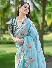 Sky Blue  Saree with Embroidered Floral Motifs & Contrasting Teal Brocade Blouse