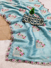 Sky Blue  Saree with Embroidered Floral Motifs & Contrasting Teal Brocade Blouse