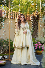 Embroidery Designer Off-White Georgette Sharara Suit – Mirror Embroidered Neckline with Cowrie Shell Latkans